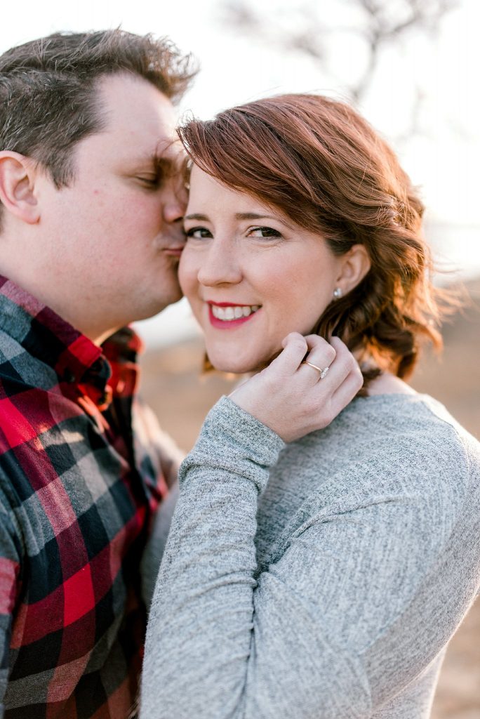 Grapevine Lake Engagement Session with Groom Kissing Bride on Cheek