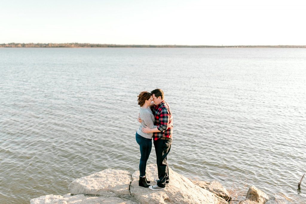 Grapevine Lake Engagement Session Snuggling on the Rocks