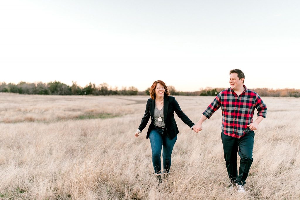 Grapevine Lake Engagement Session Running in Open Field