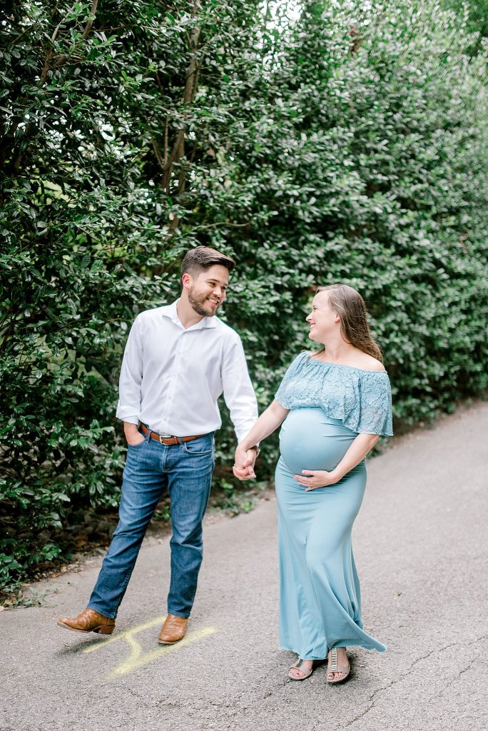 Walking hand in hand during Maternity session 