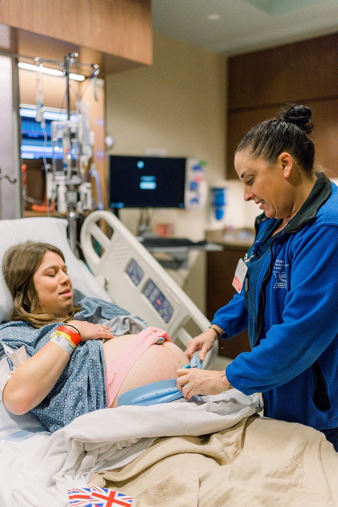 Nurse prepping mom for delivery for her Texas Health Natural Birth