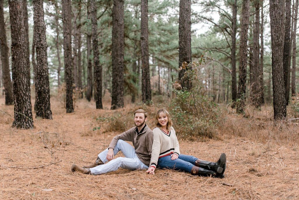 engagement photo with bride and groom in pine trees