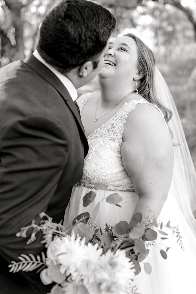 Bride and Groom laughing during their Mansfield anniversary session