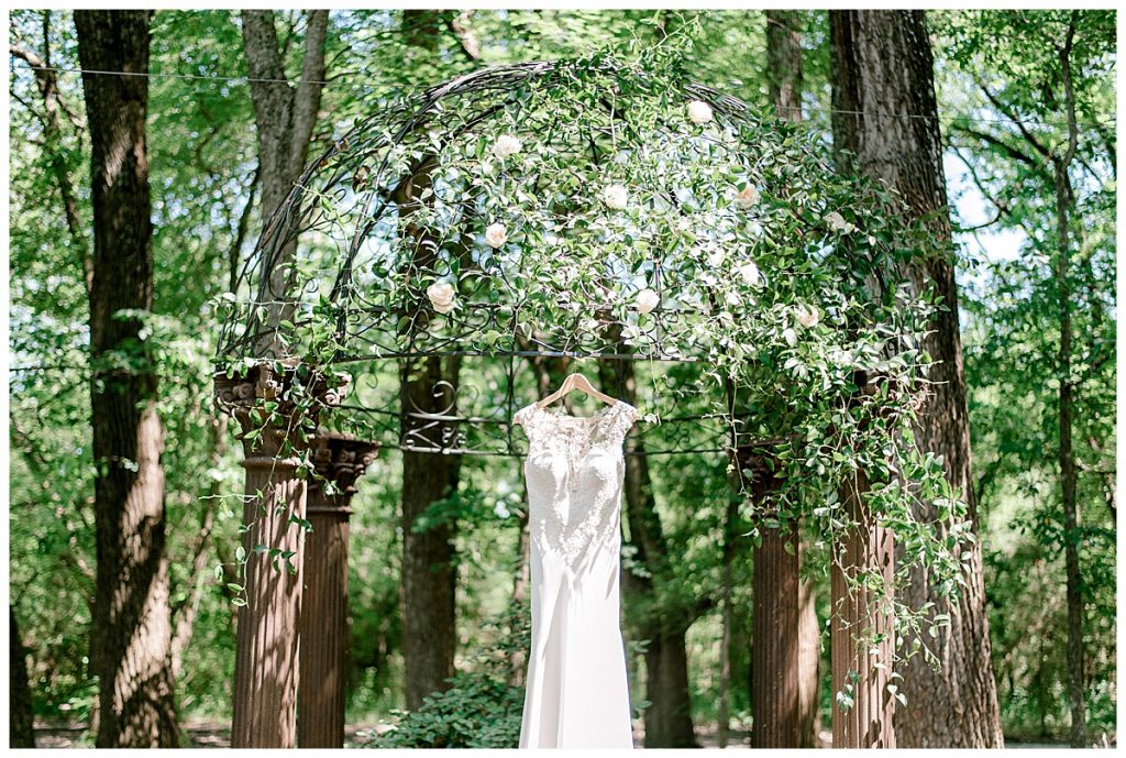 Wedding dress hanging outside under wedding gazebo- Sabel Moments Photography-detail shots