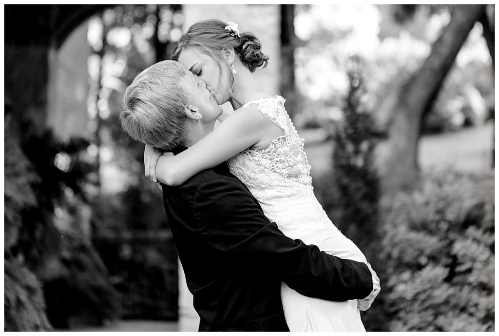 BW groom picks up bride and kisses her| Sabel Moments Photography