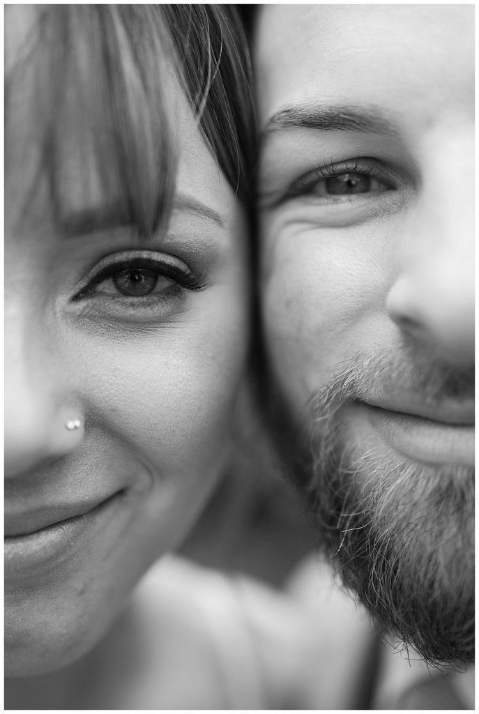 close up BW bride and groom eyes side by side