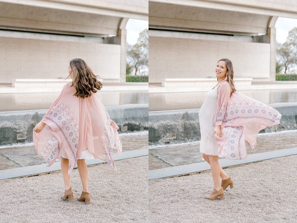 Mom twirling during her maternity session 