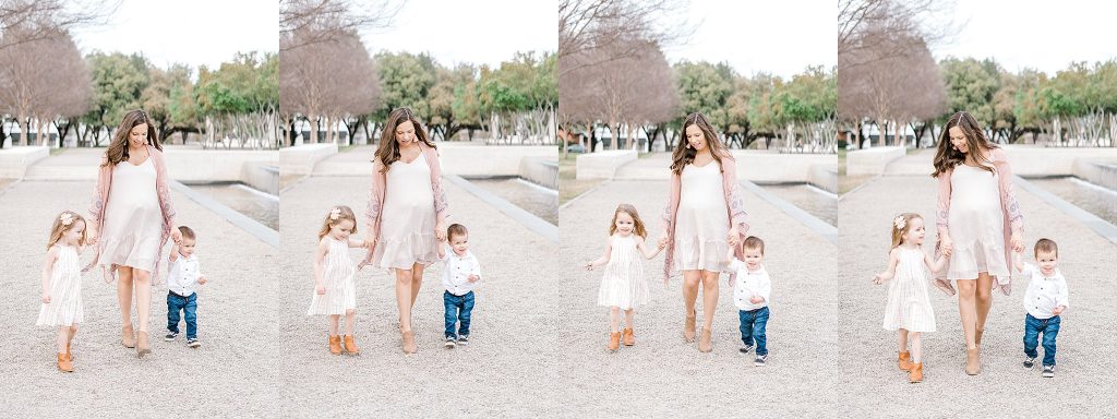Walking with her kid during their Kimbell Art Maternity Shoot