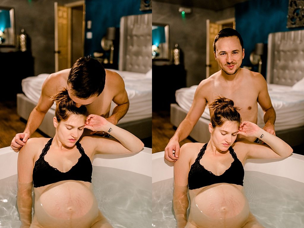 Husband rubbing wife's shoulders while she has contractions in tub
