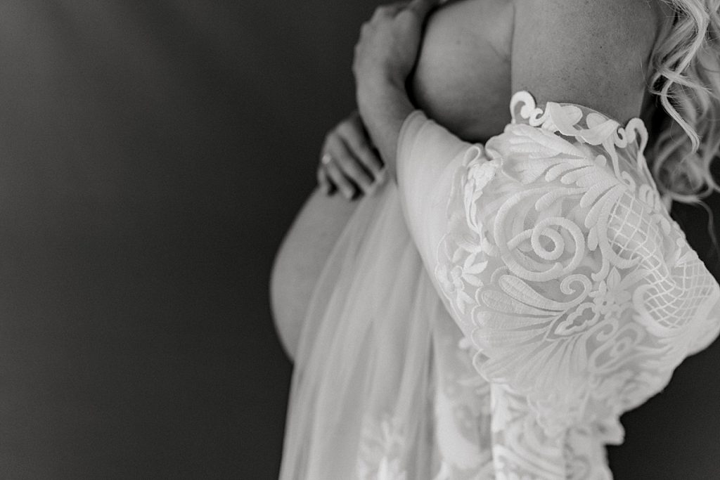 BW pregnant blonde in white lacy robe