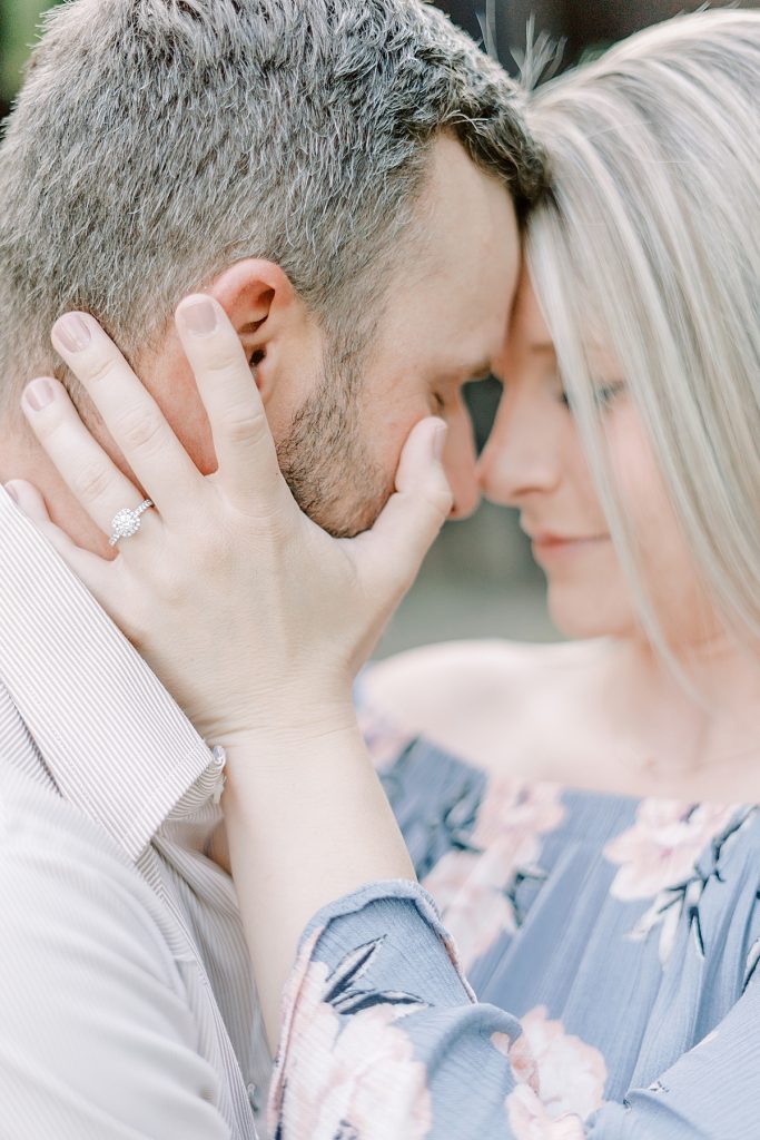Couple nuzzling in Fort Worth engagement