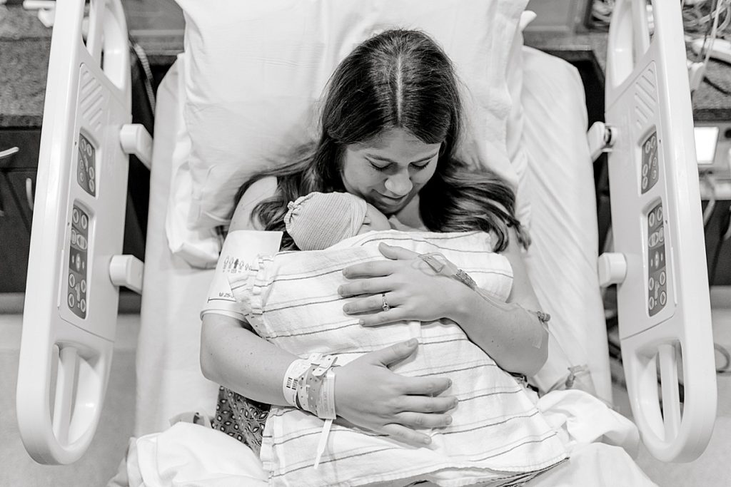 BW mom snuggling baby after her Texas Health Natural Birth