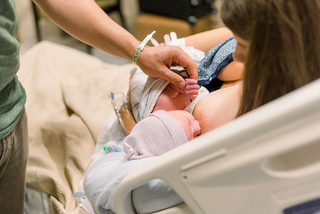 Baby breastfeeding for the first time during his Texas Health Natural Birth