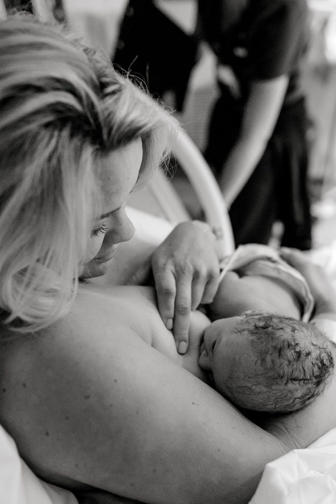 BW Mother breastfeeding newborn baby