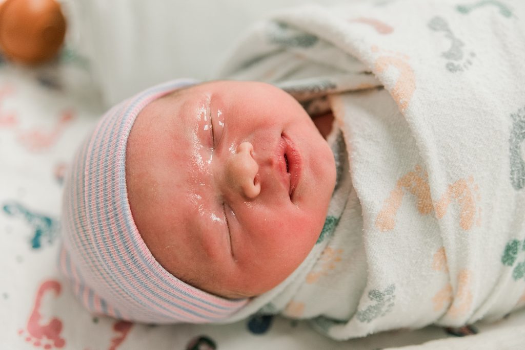Newborn swaddled baby after his Baylor C-Section Birth