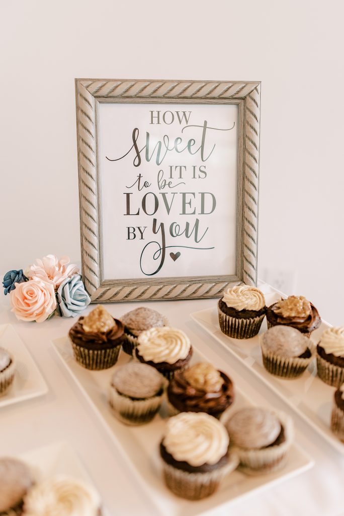 Chocolate wedding cupcakes with sign How Sweet It Is To Be Loved By You