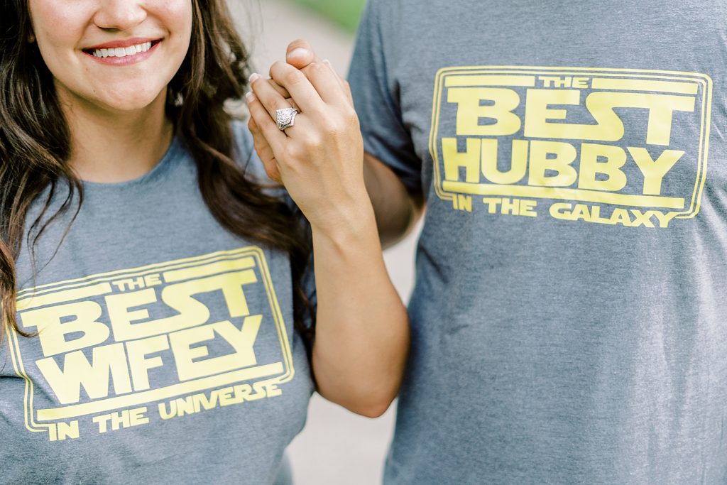 Couple side by side in Star Wars themed t-shirts