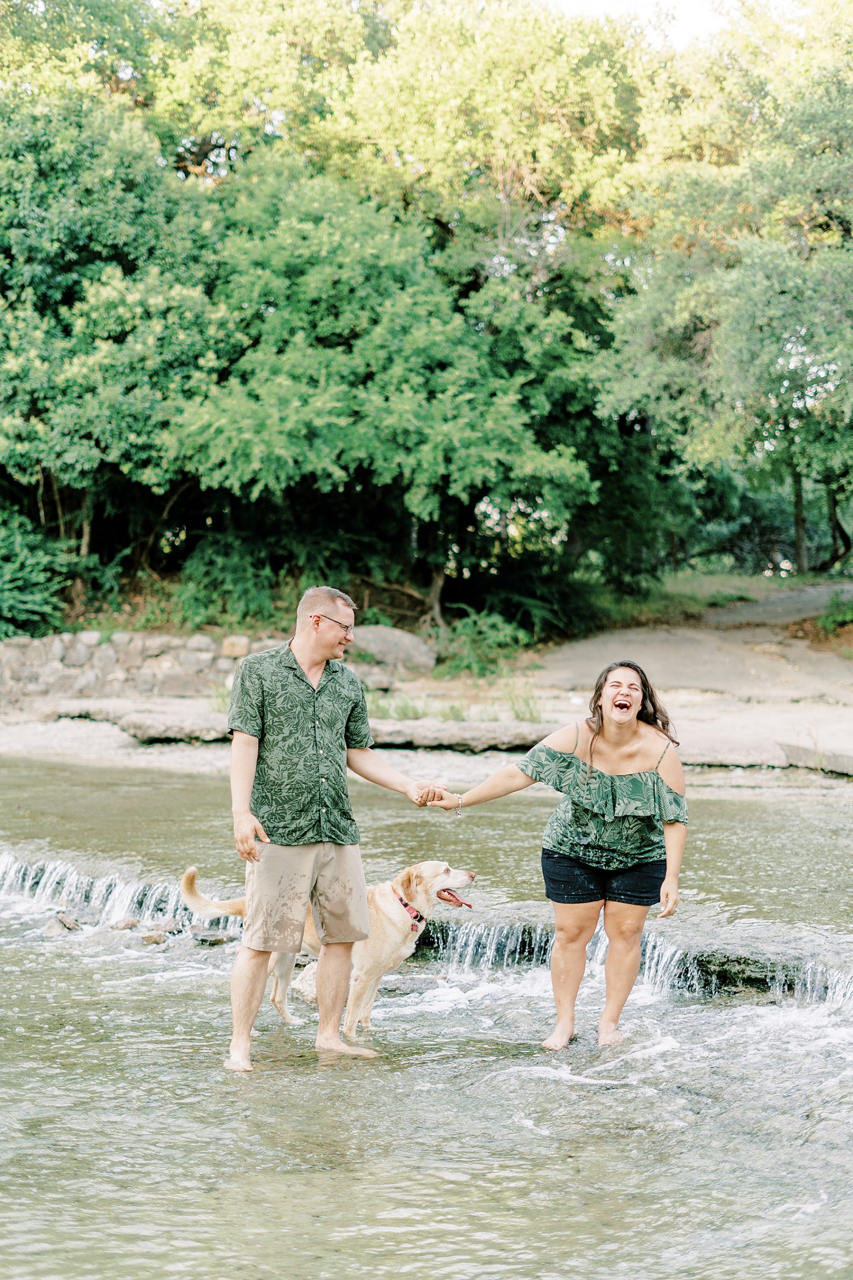 Couple laughing and playing in the water at Airfield Falls  summer session 