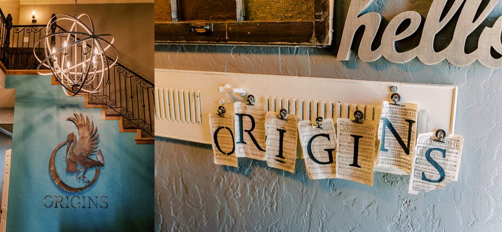 Origins sign and stork emblem at Origins Birth & Wellness Collective