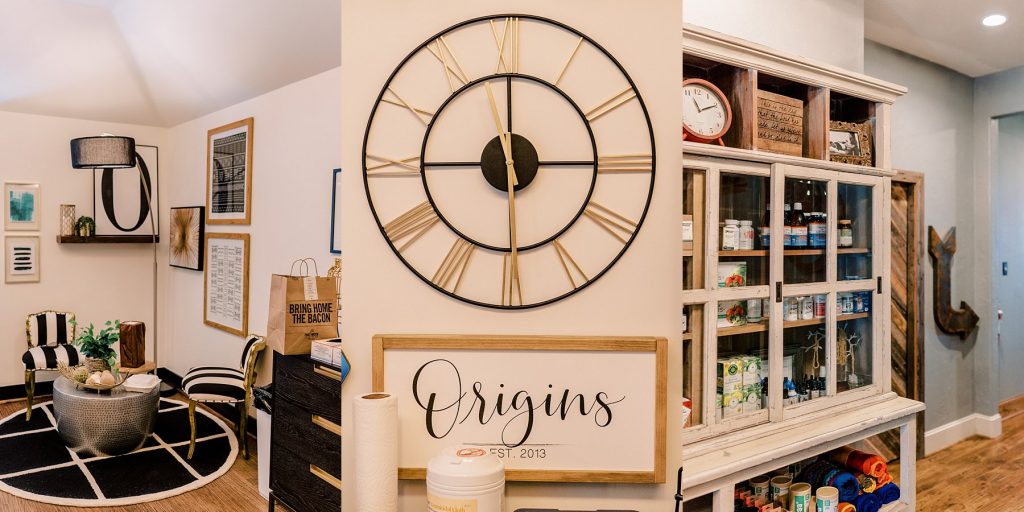 Waiting room, supplies and clock at Origins Birth & Wellness Collective Center