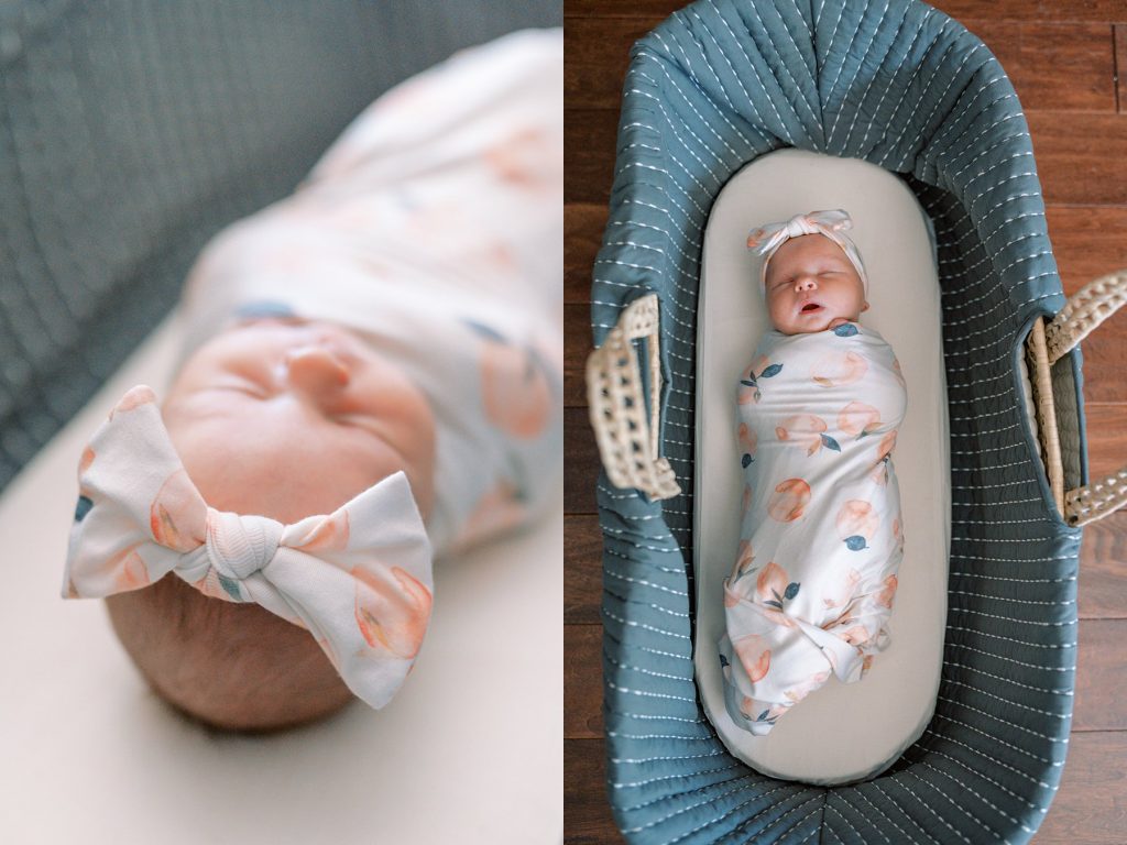Swaddled newborn baby sleeping in baby basket carrier during her lifestyle newborn session 