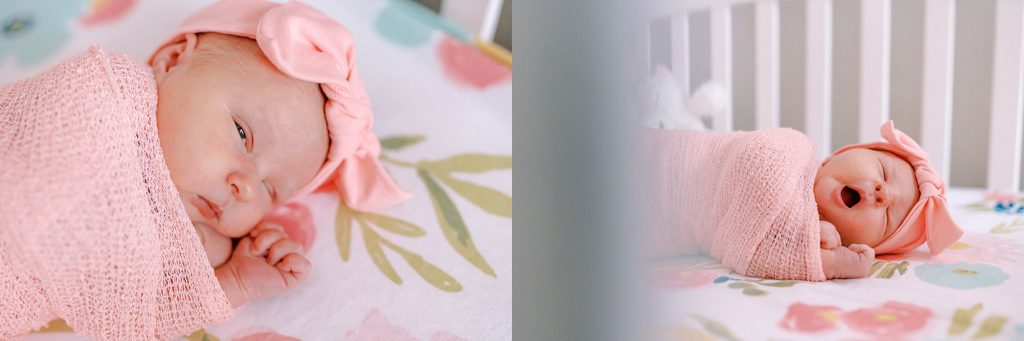 baby girl wrapped in pink blanket laying in crib yawning during her lifestyle newborn session 