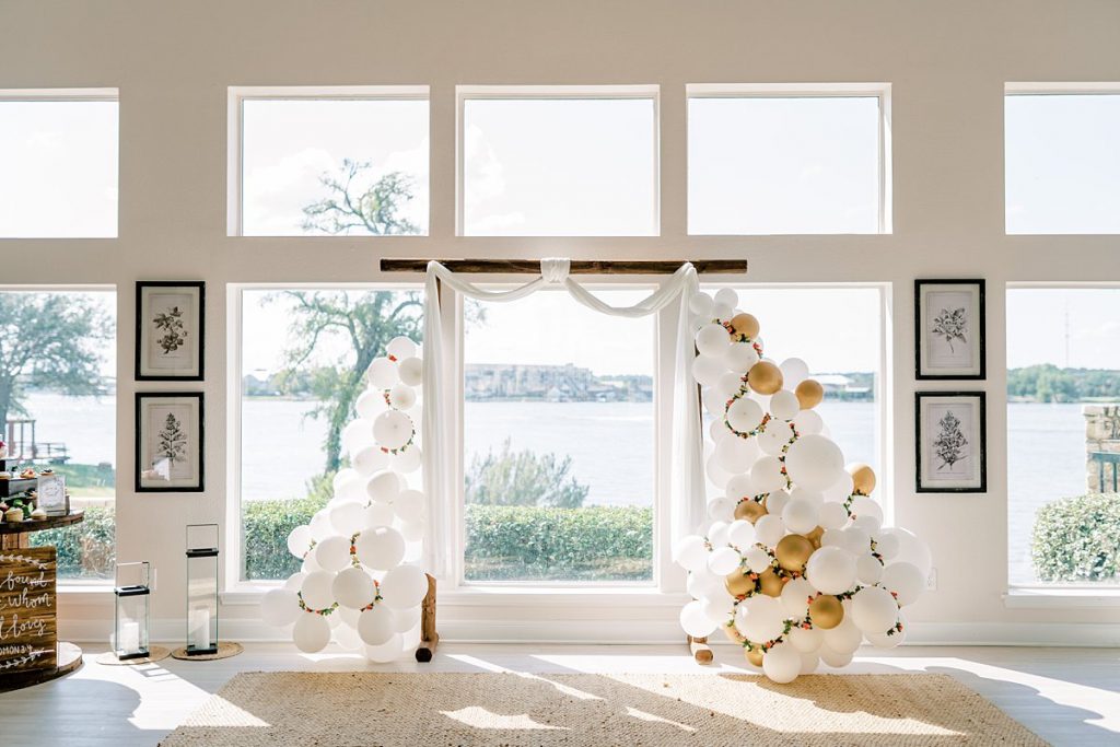 White and gold balloon wedding arch at Lake Granbury elopement in Texas