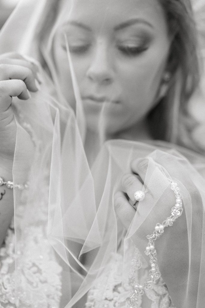 BW bridal jewelry revealed through bridal veil