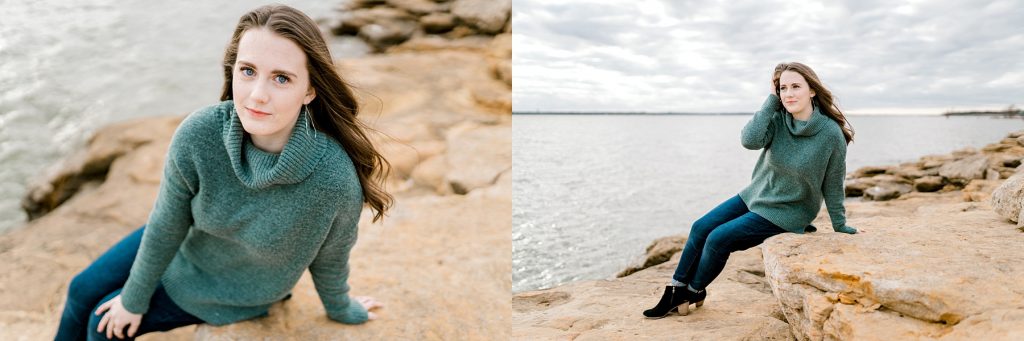 Senior girl sitting on rock by lake