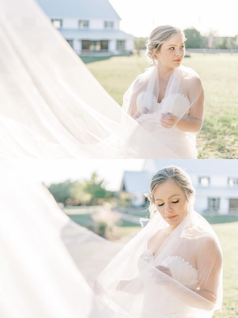 Bride wearing sweeping wedding veil over shoulders