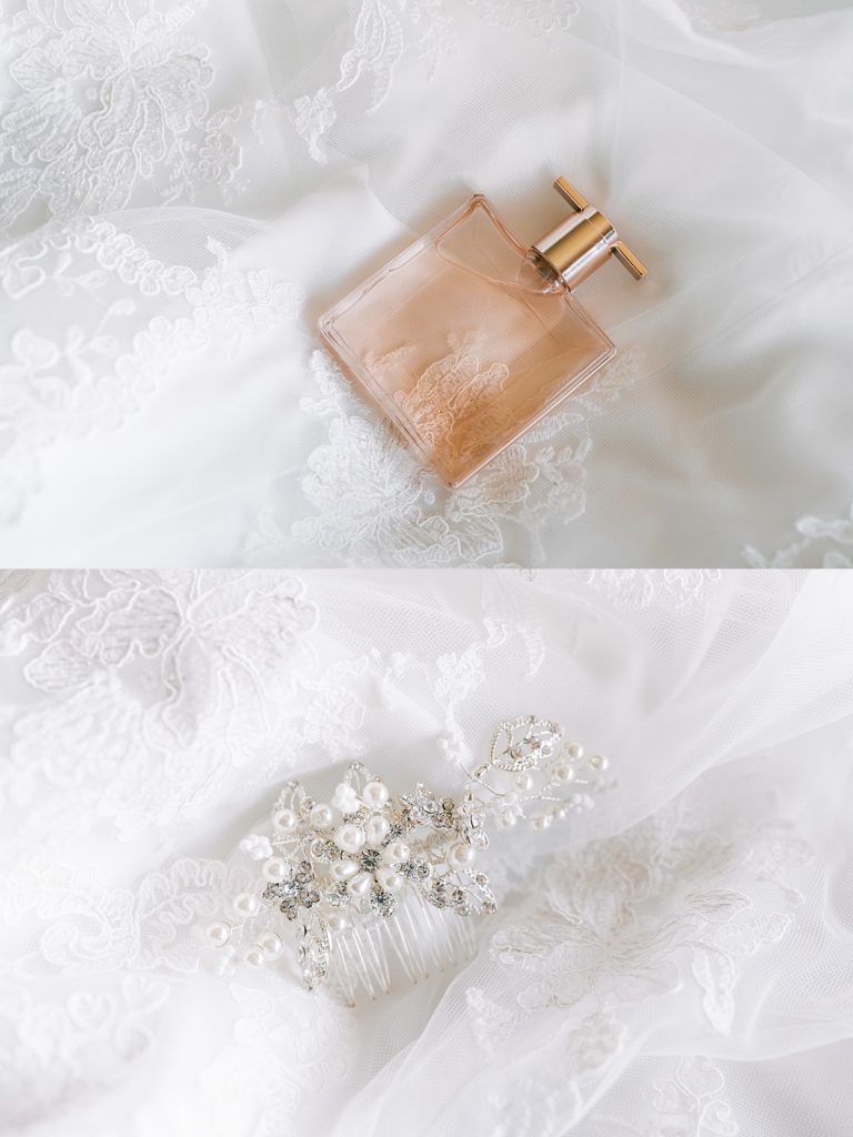 perfume and bridal hair pin on lace