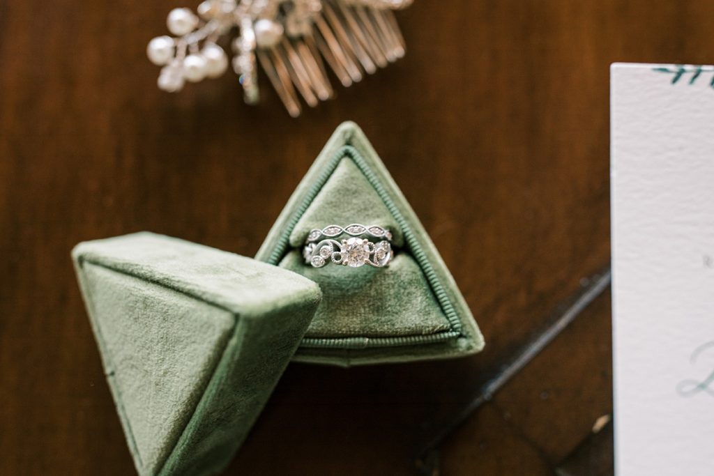 wedding ring in green triangle ring box