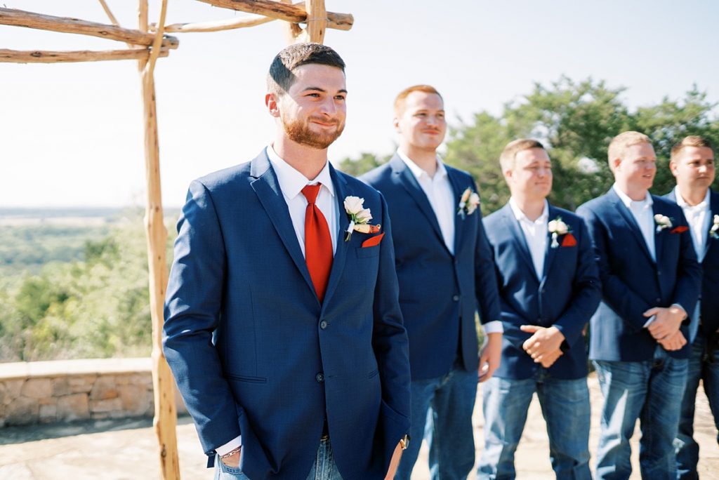 Groom standing at alter