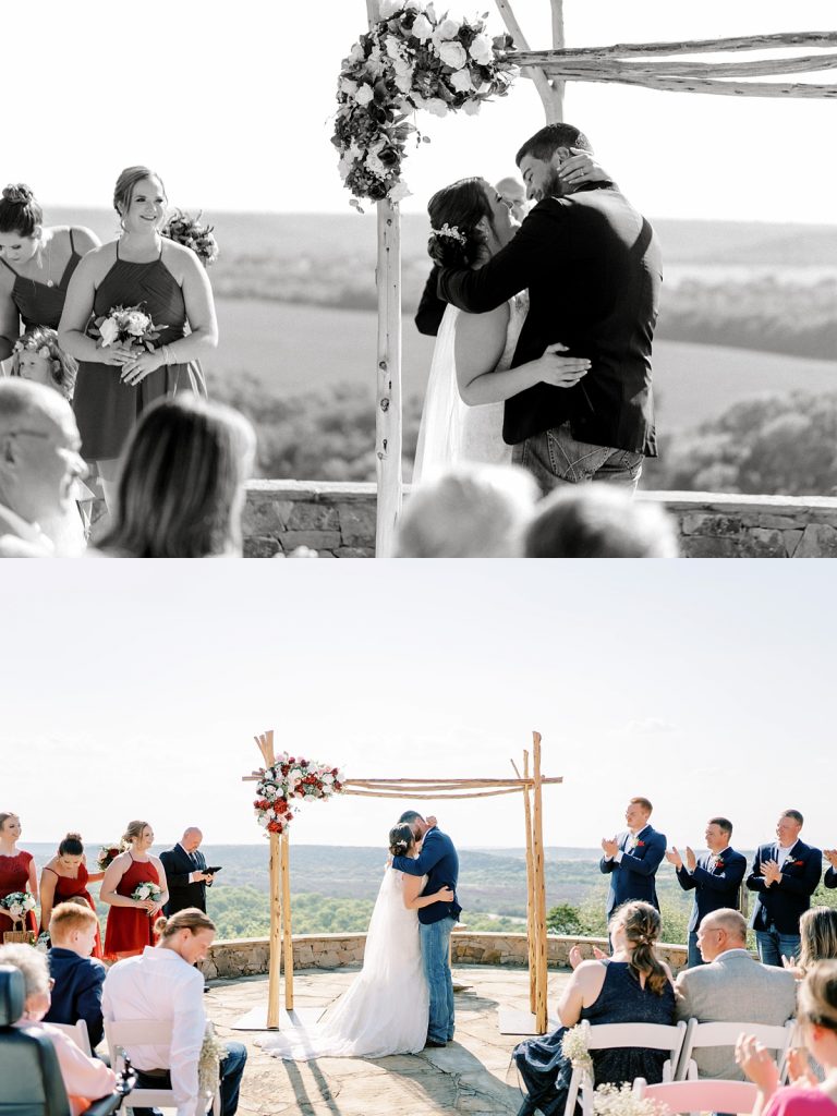 Bride and groom first kiss at alter- wildcatter ranch wedding