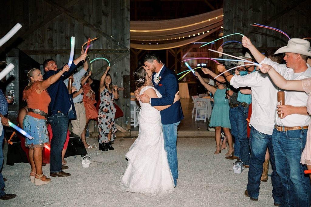bride and groom glow stick grand exit