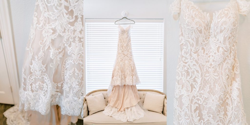 lace wedding gown hanging from window