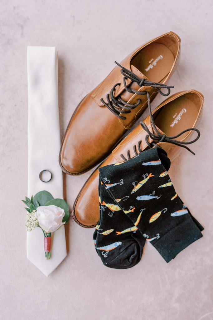 grooms details- tie, ring, shoes, wedding boutonnere