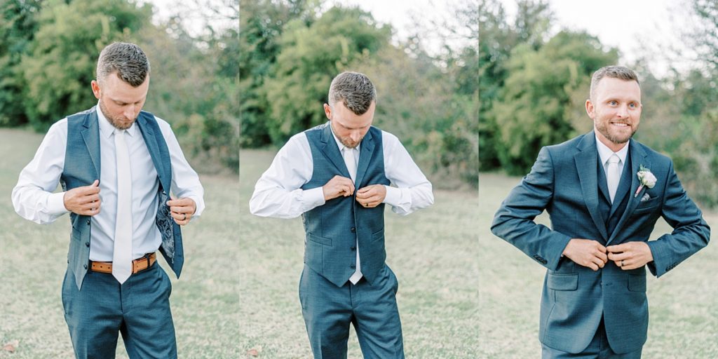 groom buttoning suit