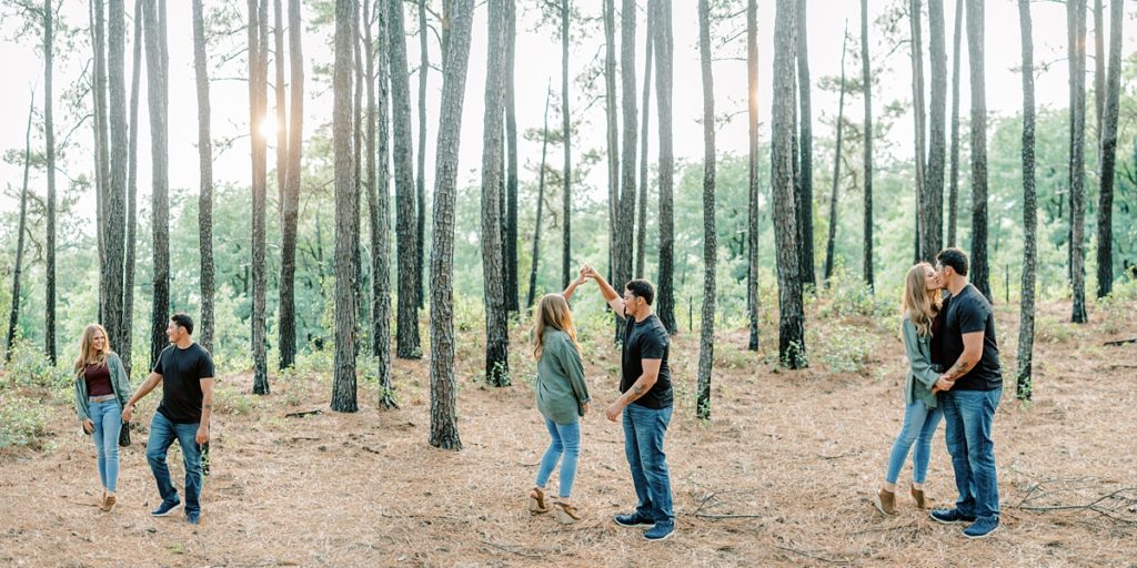 Couple dancing in woods in LBJ Grasslands anniversary session