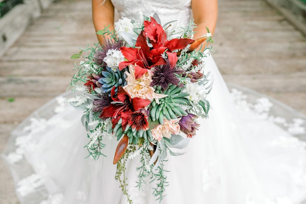 Bride standing holding wedding bouquet in Fort Worth Stockyards bridal session