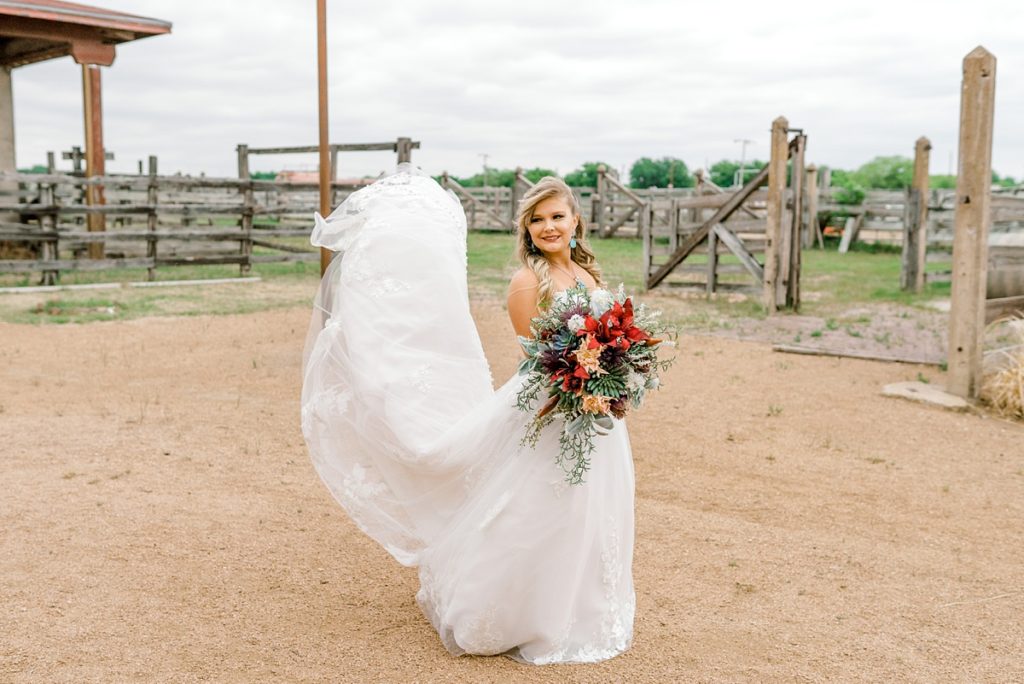 Bride standing at ranch in Fort Worth bridal session
