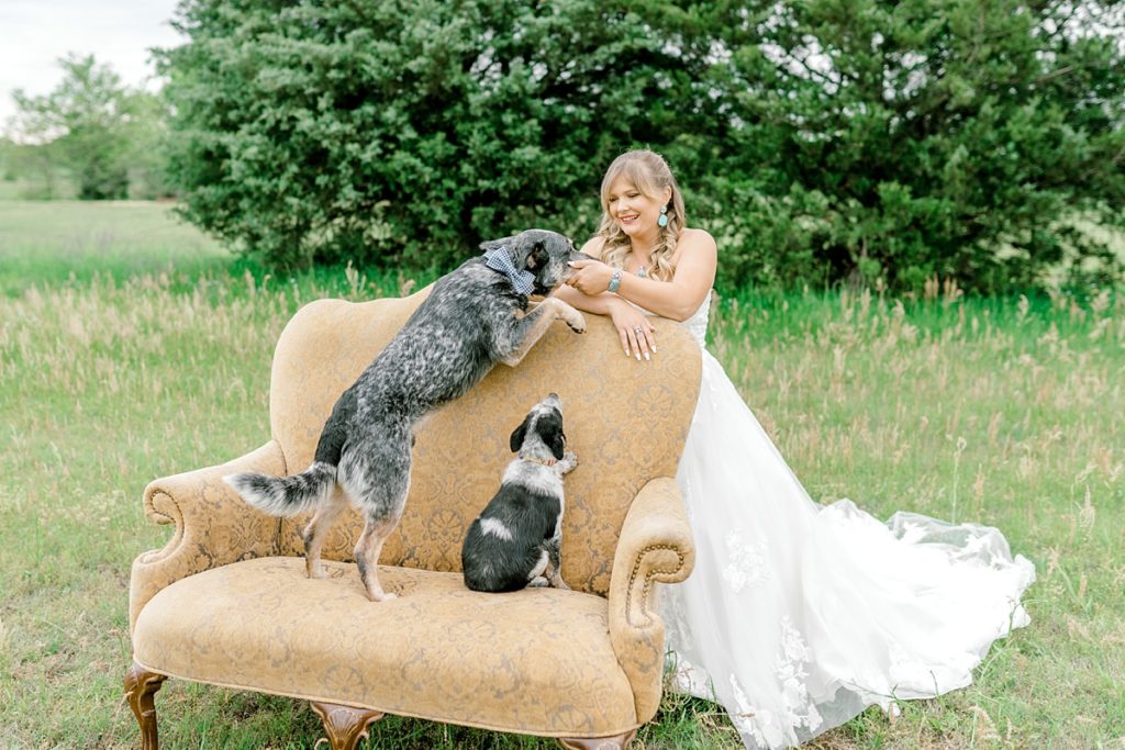 Bride playing with her pups