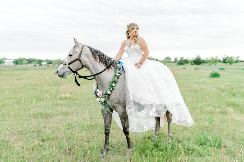 Bride riding horse in Fort Worth bridal session