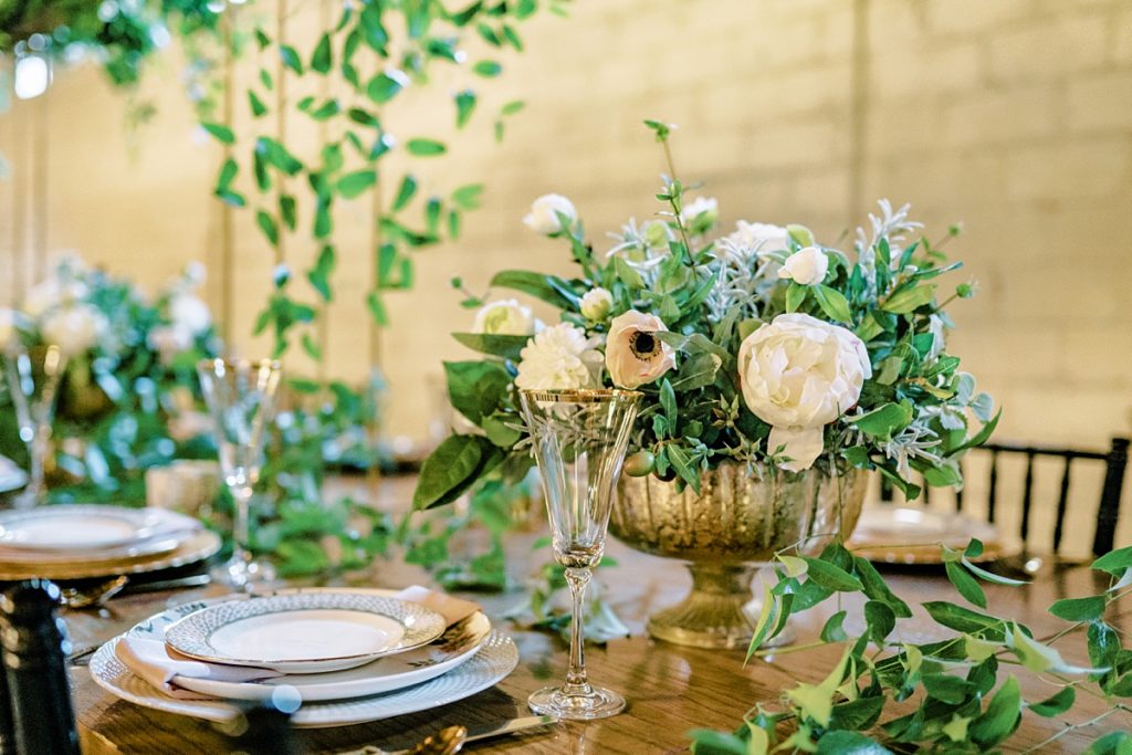 wedding dinner table with florals