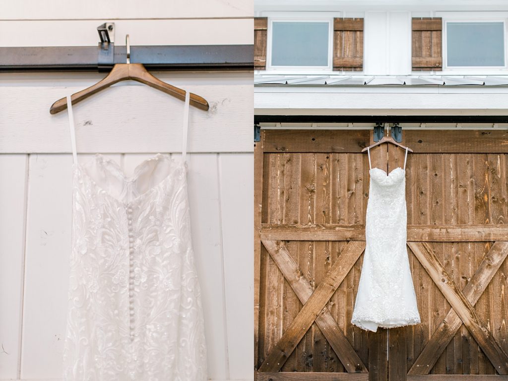 wedding gown hanging on barn doors