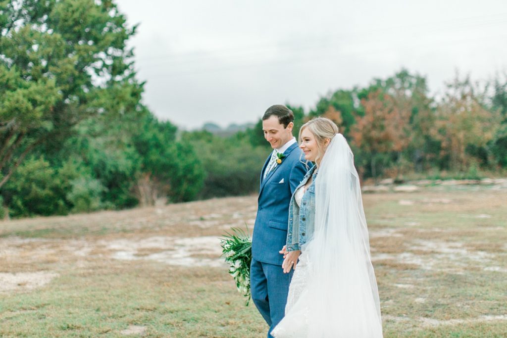 bride and groom walking at Five Oaks Farm