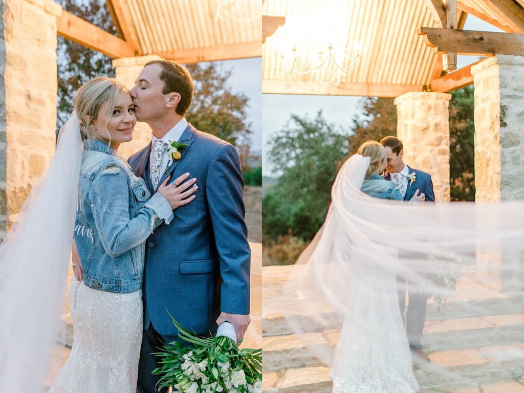 Bride and groom kissing with sweeping veil at Five Oaks Farm