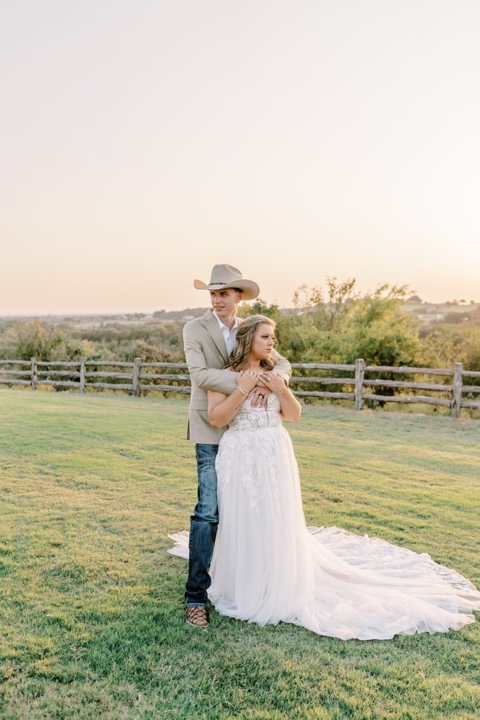 Bride and groom standing at Diamond H3 Ranch
