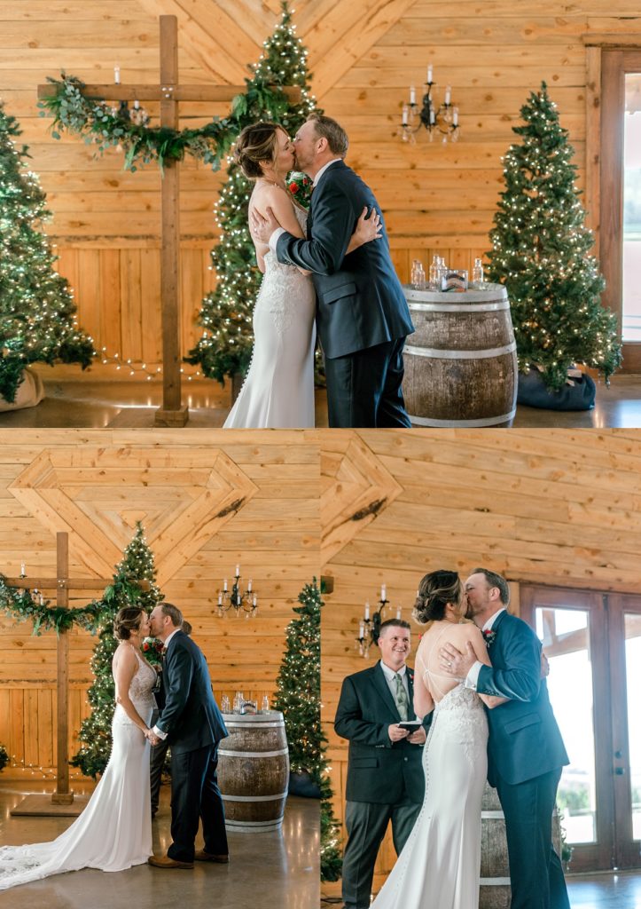 bride and groom kiss at alter