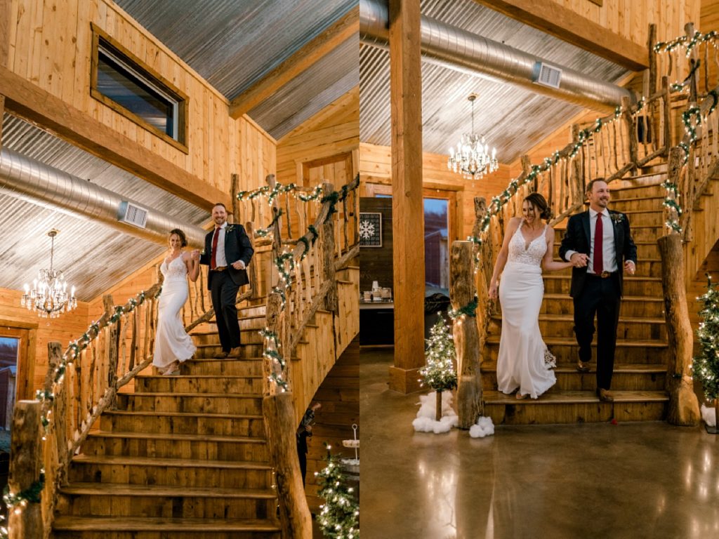 bride and groom walking down staircase to reception